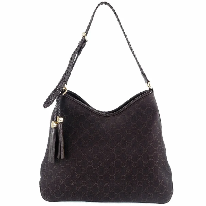 Ladies Gucci shoulder bags with a magnetic - closure flapLadies Gucci shoulder bags with a magnetic - closure flapGucci One Shoulder Tassel 336659 GG Canvas Brown Women's Bag