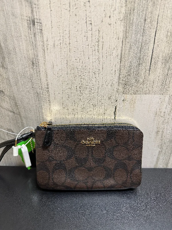 Coach Rogue bags featuring the signature C - hardware for a branded lookCoach Rogue bags featuring the signature C - hardware for a branded lookWallet Designer By Coach  Size: Medium