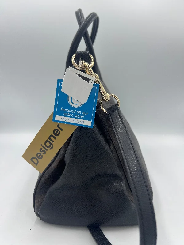 Coach bags with a back - zip pocket for storing valuables securelyCoach bags with a back - zip pocket for storing valuables securelyHandbag Designer By Coach  Size: Medium