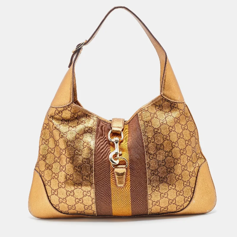 Women Gucci bags with a snap - button closure and a decorative charmWomen Gucci bags with a snap - button closure and a decorative charmGucci Gold Guccissima Leather Web Jackie O Bouvier Medium Hobo