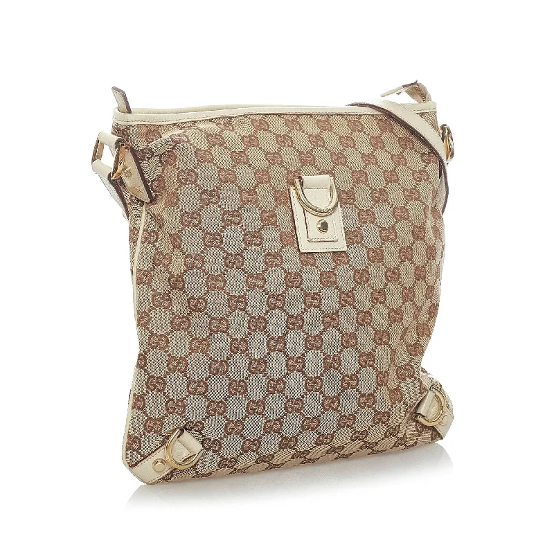 Women Gucci Sylvie bags with a detachable ribbon detailWomen Gucci Sylvie bags with a detachable ribbon detailGucci GG Canvas Abbey D-Ring Crossbody Bag (33500)