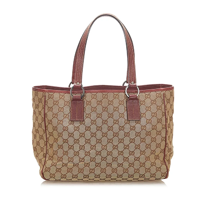 Ladies Gucci shoulder bags with a wide - width strapLadies Gucci shoulder bags with a wide - width strapGucci GG Canvas Tote Bag (SHG-17317)