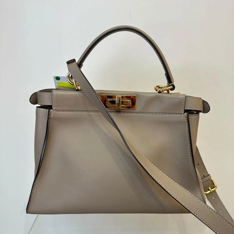 Small - sized Fendi crossbody bags in smooth calfskin leather for a compact and stylish carrySmall - sized Fendi crossbody bags in smooth calfskin leather for a compact and stylish carrySmall - sized Fendi crossbody bags in smooth calfskin leather for a compact and stylish carryFendi Leather Peekaboo 2Way Bag