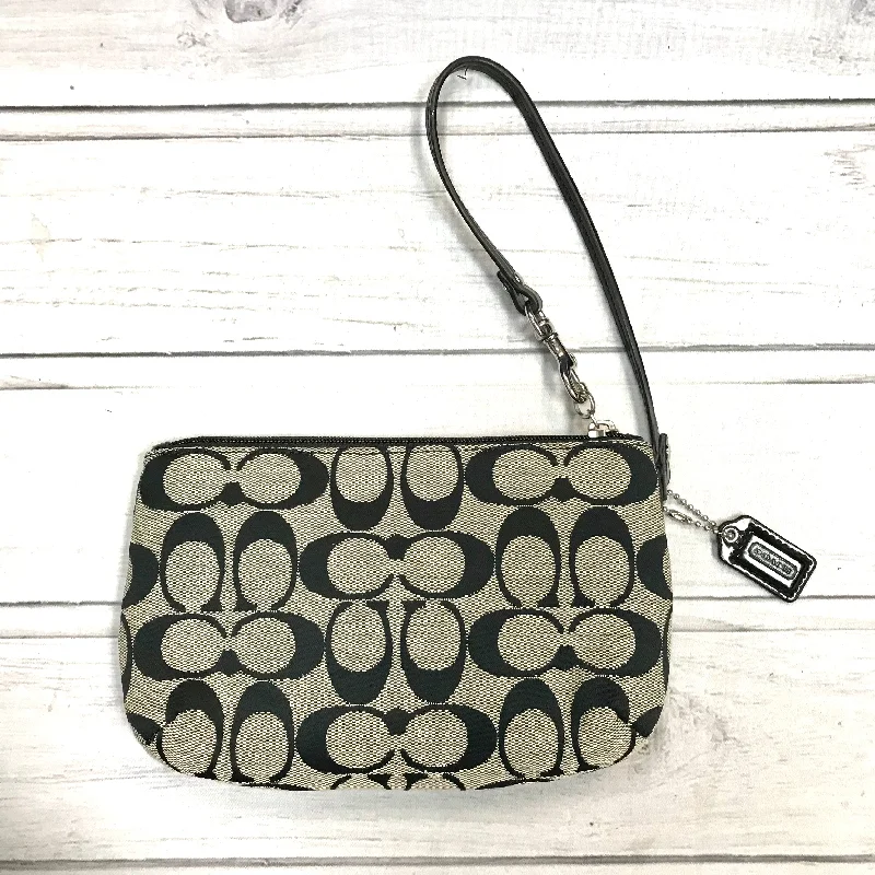 Coach Rogue bags with a detachable shoulder strap for versatile carryingCoach Rogue bags with a detachable shoulder strap for versatile carryingWristlet Designer By Coach  Size: Medium