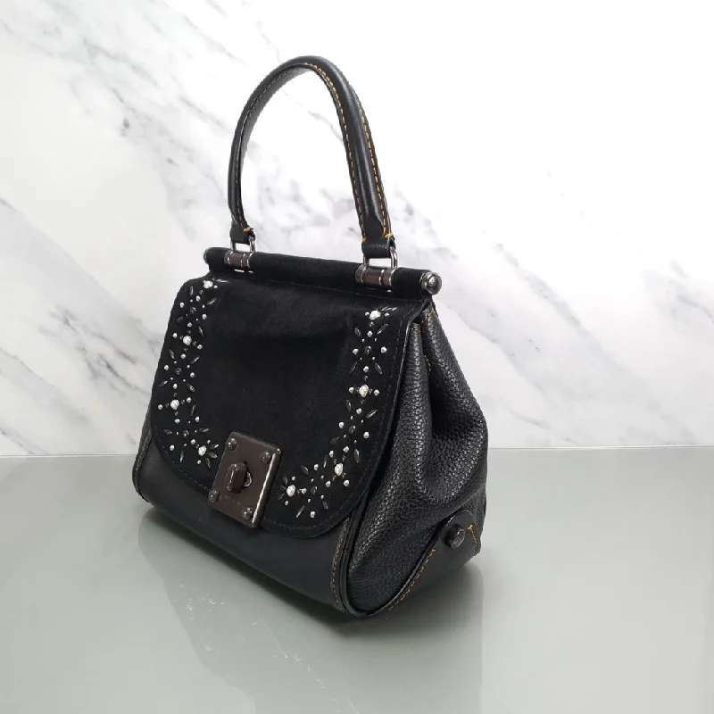 Coach Rogue bags with a detachable shoulder strap for versatile carryingCoach Rogue bags with a detachable shoulder strap for versatile carryingCoach Drifter Tophandle Crossbody Bag with Pearl Prairie Rivets in Black Mixed Leathers & Suede - SAMPLE BAG