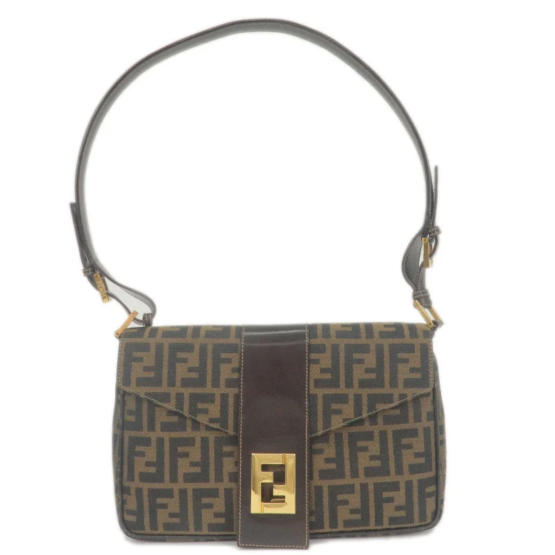 Fendi Baguette bags with a detachable charm featuring the brand's mascotFendi Baguette bags with a detachable charm featuring the brand's mascotFendi Baguette bags with a detachable charm featuring the brand's mascotFENDI Zucca Canvas Leather Shoulder Bag Brown Black 26434