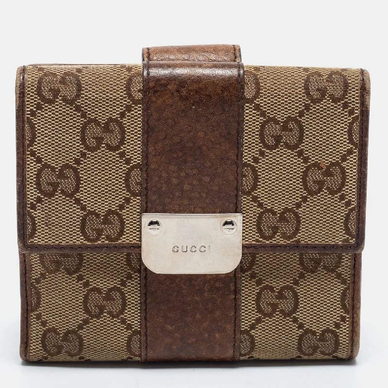 Women Gucci crossbody bags in a bold red colorWomen Gucci crossbody bags in a bold red colorGucci Brown/Beige GG Canvas and Leather Flap French Wallet