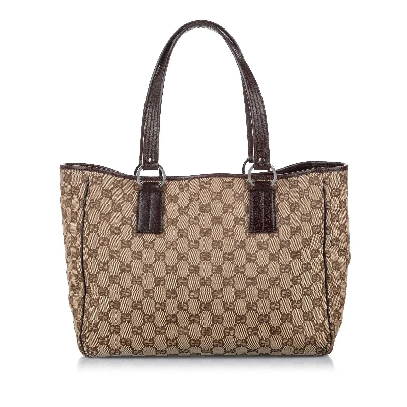 Women Gucci Sylvie bags with a crystal - embellished web stripeWomen Gucci Sylvie bags with a crystal - embellished web stripeGucci GG Canvas Tote Bag (SHG-17473)