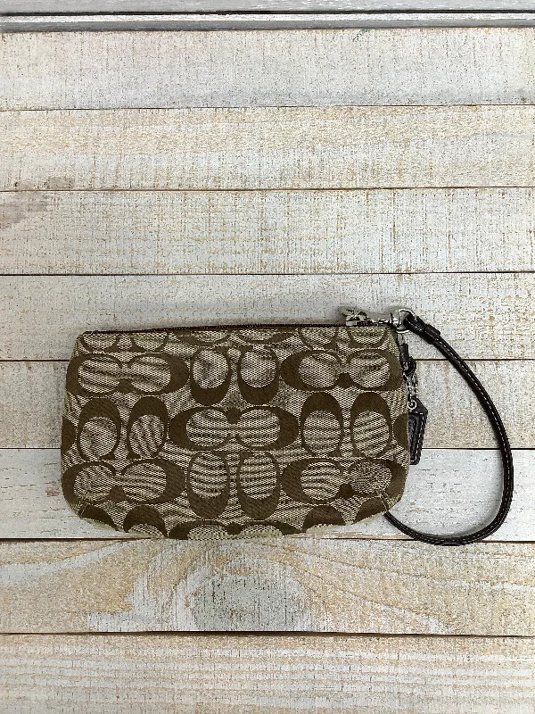 Coach bags with a back - zip pocket for storing valuables securelyCoach bags with a back - zip pocket for storing valuables securelyWristlet Designer By Coach  Size: Medium