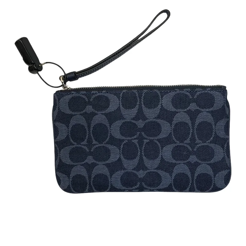 Coach bags with a back - zip pocket for storing valuables securelyCoach bags with a back - zip pocket for storing valuables securelyWristlet Designer By Coach  Size: Medium