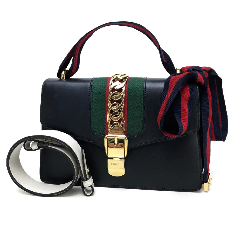 Gucci Marmont bags for women with a contrast - colored interiorGucci Marmont bags for women with a contrast - colored interiorGUCCI Shoulder Bag 421882 leather black Sherry line Silvi Small Ribbon Women Secondhand