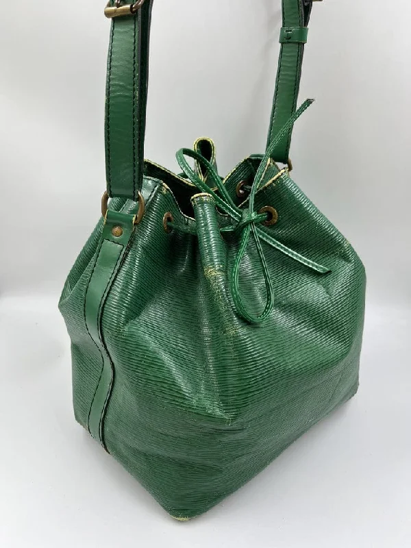 Ladies Louis Vuitton Petite Malle bags in a pastel color for a soft lookLouis Vuitton Petit Noé Bag - Green