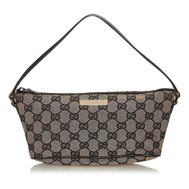 Women Gucci Sylvie bags with a detachable ribbon detailWomen Gucci Sylvie bags with a detachable ribbon detailGucci GG Canvas Boat Baguette