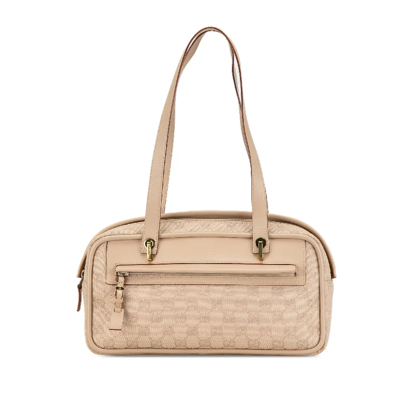 Women Gucci Sylvie bags with a monogram - embossed leatherBrown Gucci GG Canvas Shoulder Bag