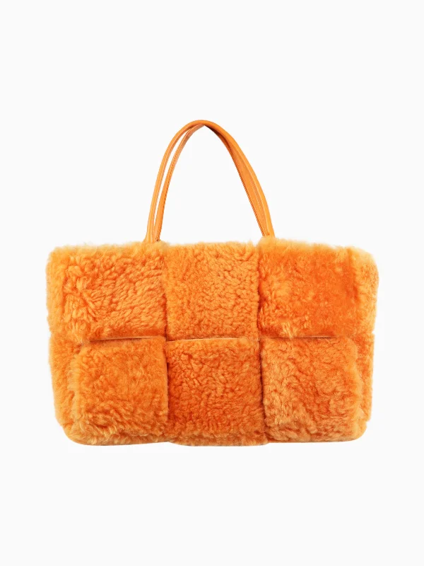 Trendy Hermes Bolide Bags in Metallic FinishesOrange faux-fur tote bag