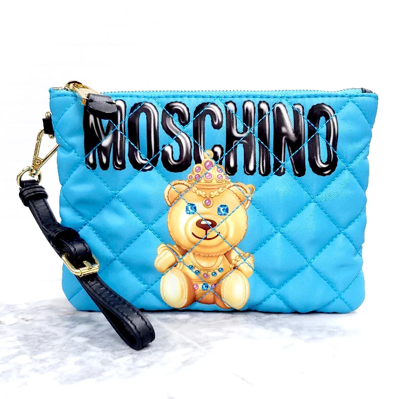 Travel - Approved Hermes Carry - on Bags with TSA - Friendly FeaturesMOSCHINO COUTURE BLUE QUILTED BEAR WRISTLET