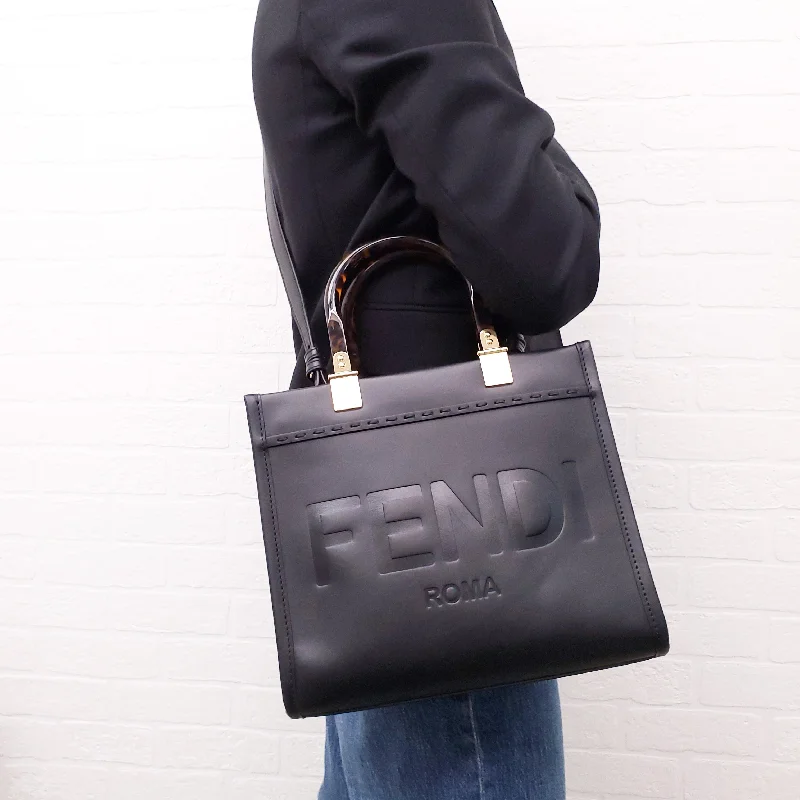 Fendi bags with a built - in USB charging port for keeping devices powered on the goFendi bags with a built - in USB charging port for keeping devices powered on the goFENDI SMALL LEATHER TOTE WITH TORTOISE HANDLES