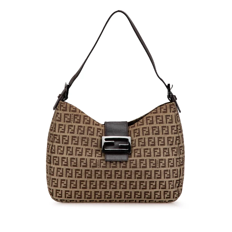 Fendi handbags with a perforated leather detail for a breathable and unique designFendi handbags with a perforated leather detail for a breathable and unique designBrown Fendi Zucchino Canvas Shoulder Bag