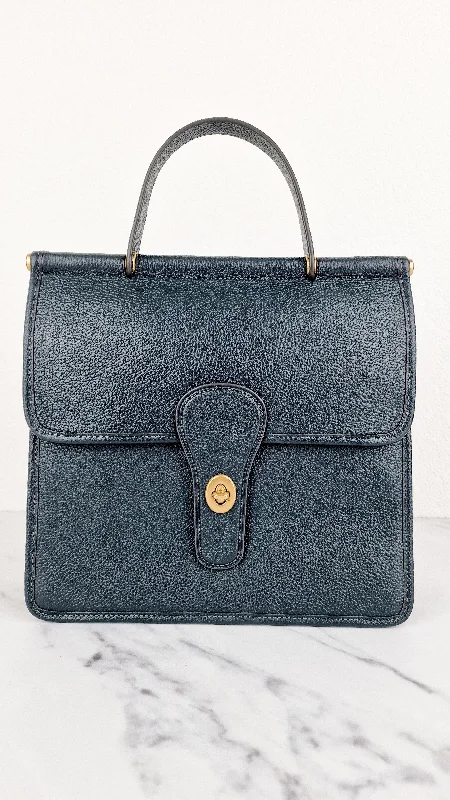 Coach Rogue bags with a monogram - embossed leather surfaceCoach Rogue bags with a monogram - embossed leather surfaceCoach Willis Tophandle in Dark Green Pebble Leather from the Limited Edition Archival Coach Silhouettes Collection - Coach 5889